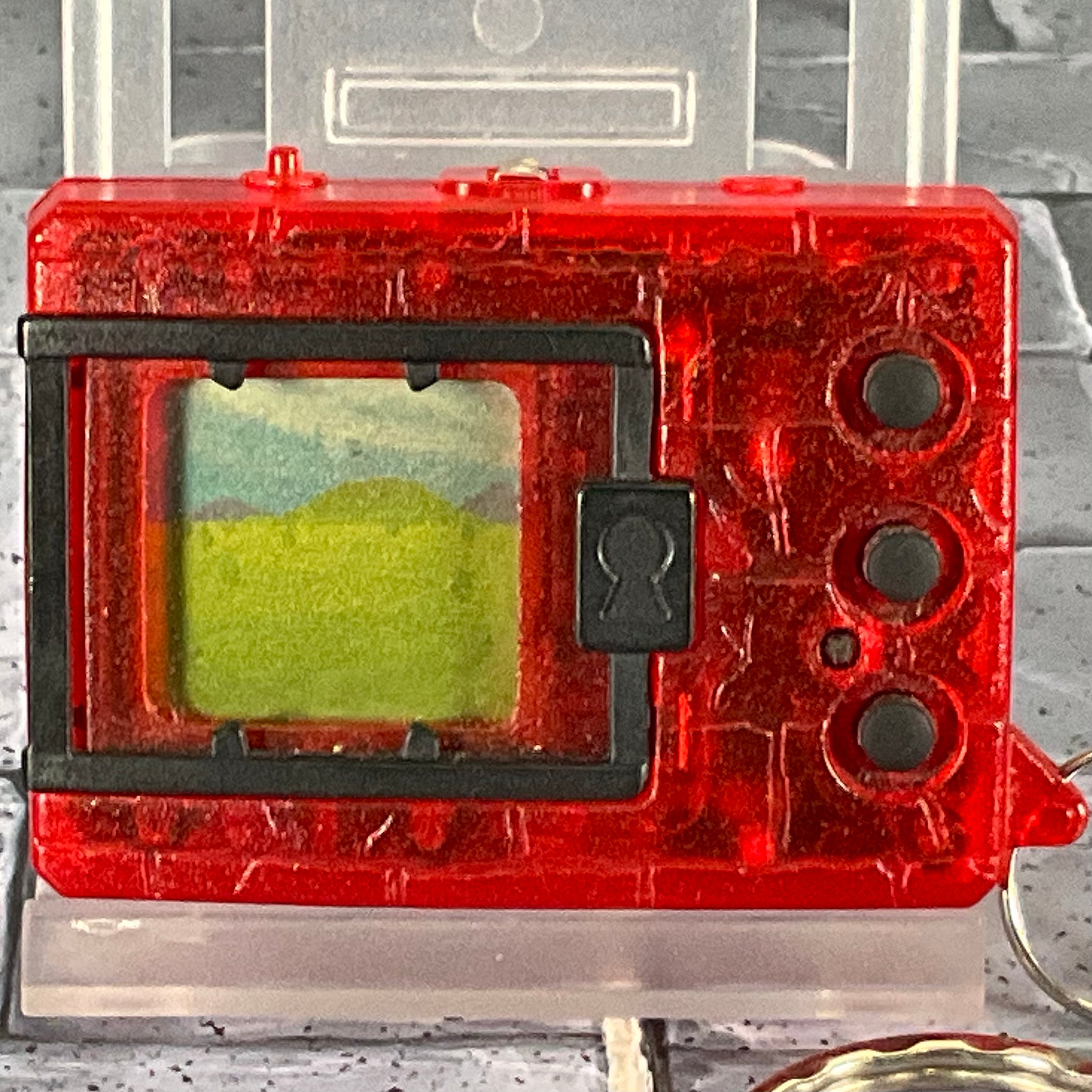 1997 Original Digimon Virtual Pet (Translucent Red)